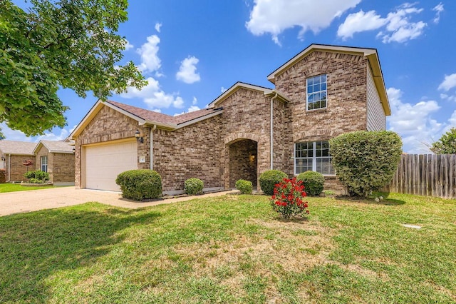 400 Hummingbird Ln, Leander, TX 78641 - traditional-style home featuring concrete driveway, an attached garage, and brick siding
