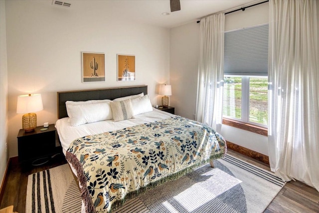 19811 W Ranch Road 152nd Rd, Llano, TX 78643 - bedroom with wood finished floors and a ceiling fan