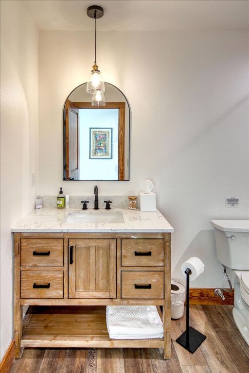 19811 W Ranch Road 152nd Rd, Llano, TX 78643 - bathroom with vanity and wood finished floors