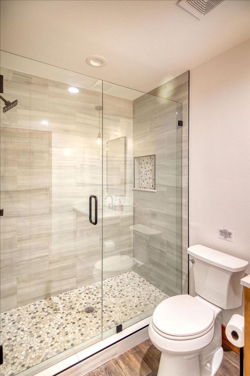 19811 W Ranch Road 152nd Rd, Llano, TX 78643 - full bath featuring a shower stall, wood finished floors, and recessed lighting
