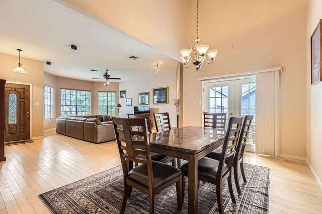 4513 Sidereal Dr, Austin, TX 78727 - dining room featuring light wood-style flooring, ceiling fan, and a chandelier
