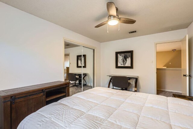 4513 Sidereal Dr, Austin, TX 78727 - carpeted bedroom with a closet and a ceiling fan
