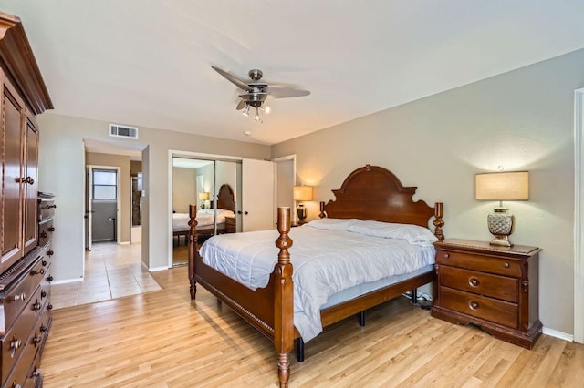 4513 Sidereal Dr, Austin, TX 78727 - bedroom with a closet, light wood-style flooring, and ceiling fan