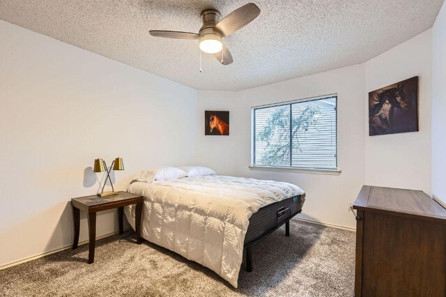 4513 Sidereal Dr, Austin, TX 78727 - bedroom featuring light colored carpet, a textured ceiling, and ceiling fan