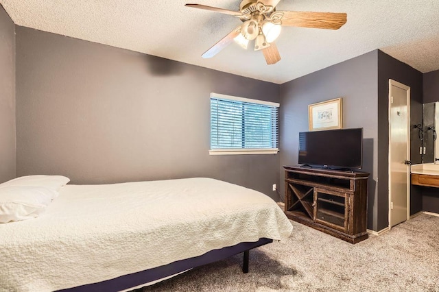 4513 Sidereal Dr, Austin, TX 78727 - bedroom with carpet floors, a textured ceiling, ceiling fan, and ensuite bath