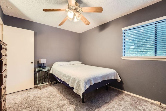 4513 Sidereal Dr, Austin, TX 78727 - carpeted bedroom featuring ceiling fan and a textured ceiling