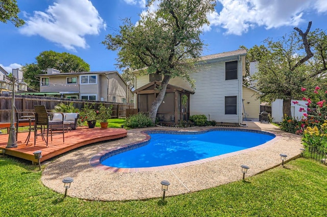 4513 Sidereal Dr, Austin, TX 78727 - view of pool with a wooden deck and a fenced backyard
