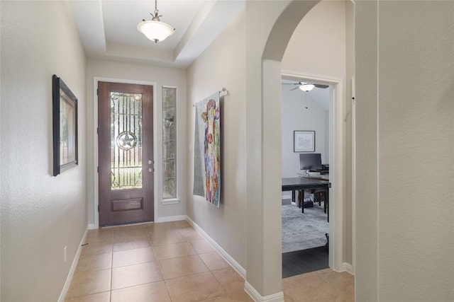 3204 Herrero Path, Cedar Park, TX 78641 - entryway with arched walkways, light tile patterned floors, and ceiling fan