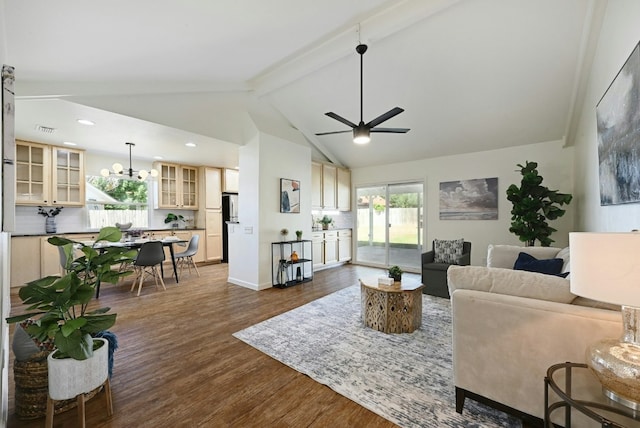 9224 Partridge Cir, Austin, TX 78758 - living room with dark wood finished floors, a chandelier, a ceiling fan, plenty of natural light, and recessed lighting