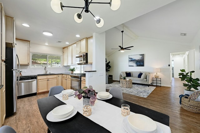 9224 Partridge Cir, Austin, TX 78758 - dining space with light wood finished floors, a ceiling fan, and recessed lighting