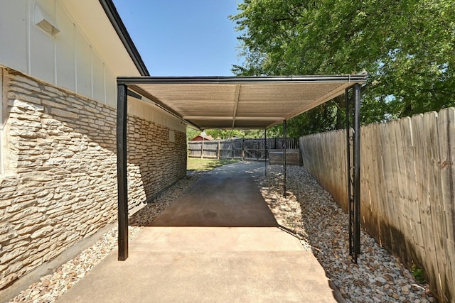 9224 Partridge Cir, Austin, TX 78758 - view of parking / parking lot featuring a carport