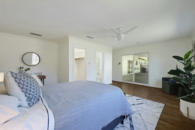 9224 Partridge Cir, Austin, TX 78758 - bedroom with wood finished floors, crown molding, and a ceiling fan