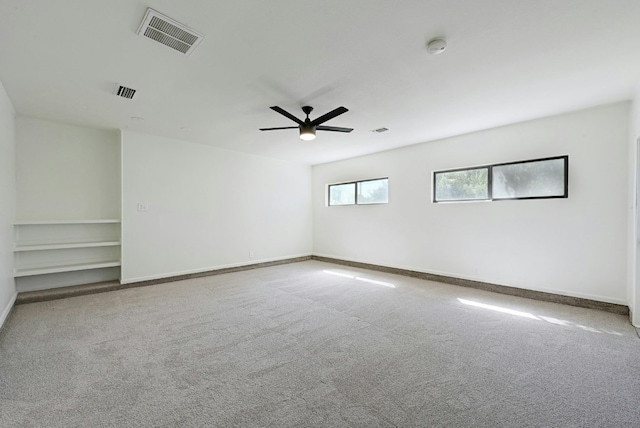 9224 Partridge Cir, Austin, TX 78758 - empty room featuring carpet, a ceiling fan, and a smoke detector