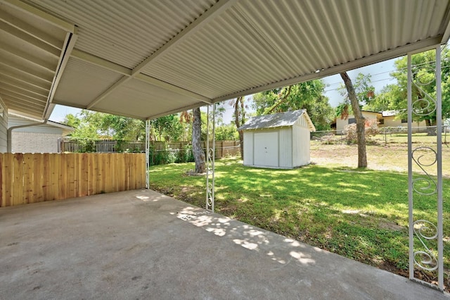 4803 Broadhill Dr, Austin, TX 78723 - fenced backyard with a patio and a storage shed
