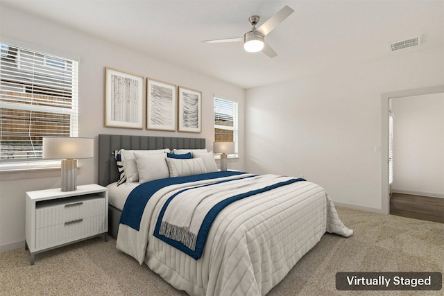 13804 Bavarian Forest Dr, Pflugerville, TX 78660 - bedroom with light carpet and ceiling fan