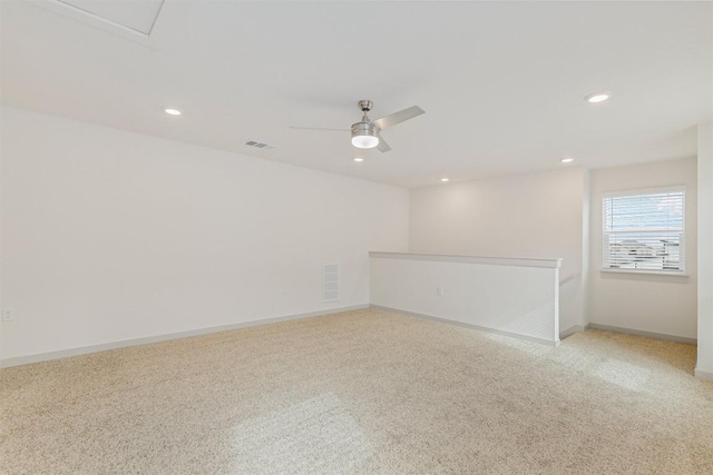 13804 Bavarian Forest Dr, Pflugerville, TX 78660 - empty room with light colored carpet, recessed lighting, and ceiling fan