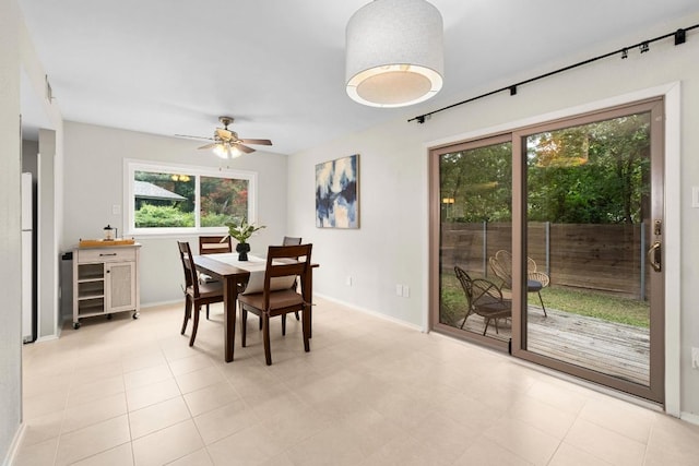 5901 Camino Seco, Austin, TX 78731 - dining room featuring ceiling fan and baseboards