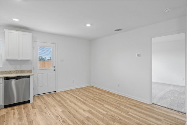 524 Aplite Pass, Maxwell, TX 78656 - unfurnished dining area featuring light wood-style flooring and recessed lighting