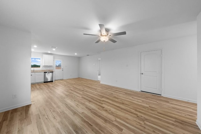 524 Aplite Pass, Maxwell, TX 78656 - unfurnished living room with ceiling fan, light wood-type flooring, and recessed lighting
