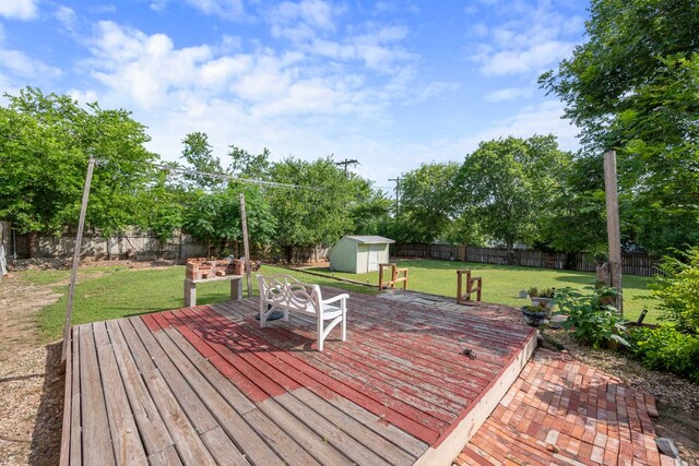 1121 Nola Ruth Blvd, Harker Heights, TX 76548 - wooden deck with a storage shed and a fenced backyard