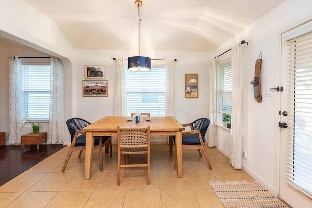 13920 Marathon Rd, Austin, TX 78717 - dining room featuring light tile patterned floors and vaulted ceiling
