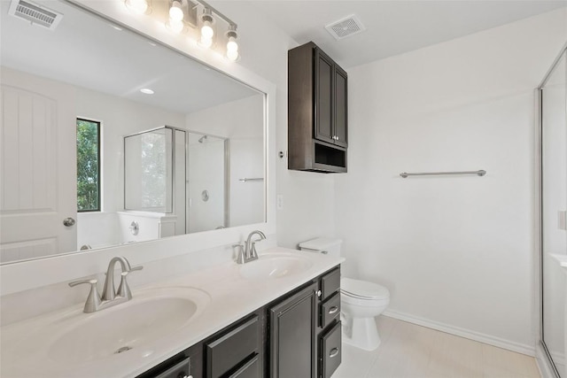 2017 Woodway Dr, Leander, TX 78641 - bathroom with a stall shower and double vanity