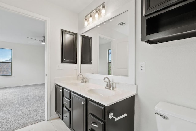 2017 Woodway Dr, Leander, TX 78641 - bathroom featuring double vanity and ceiling fan
