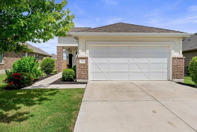 136 Gidran Trl, Georgetown, TX 78626 - ranch-style house featuring brick siding, concrete driveway, an attached garage, a front lawn, and a shingled roof