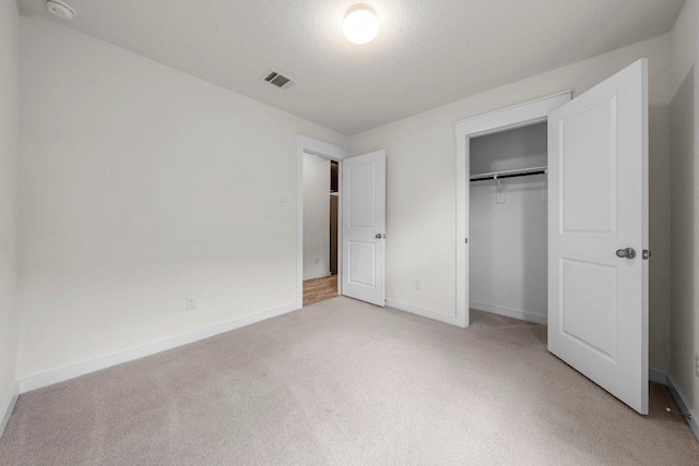 136 Gidran Trl, Georgetown, TX 78626 - unfurnished bedroom with light colored carpet and a closet
