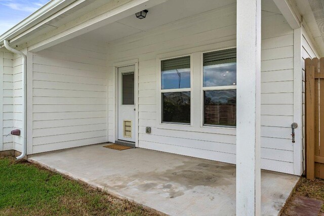 136 Gidran Trl, Georgetown, TX 78626 - property entrance featuring a patio area