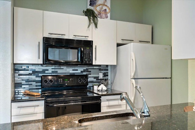 2804 Rio Grande St Unit 211, Austin, TX 78705 - kitchen with black appliances, white cabinetry, tasteful backsplash, and dark stone countertops