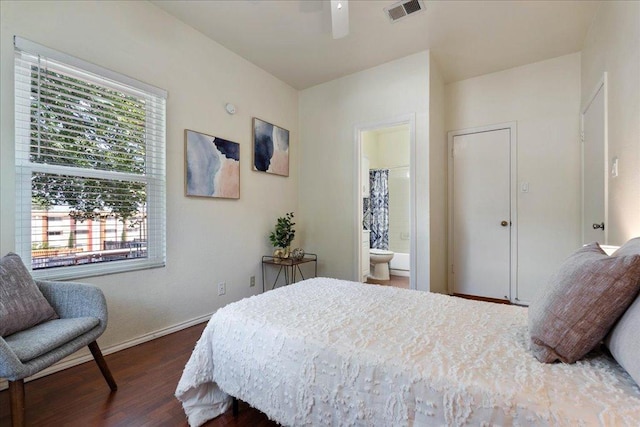 2804 Rio Grande St Unit 211, Austin, TX 78705 - bedroom with dark wood-type flooring and connected bathroom