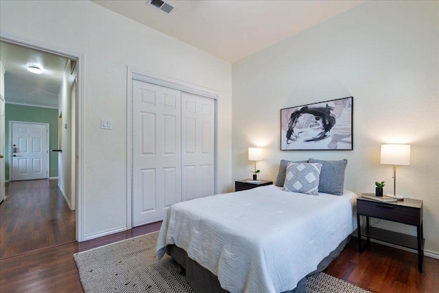 2804 Rio Grande St Unit 211, Austin, TX 78705 - bedroom featuring wood finished floors and a closet
