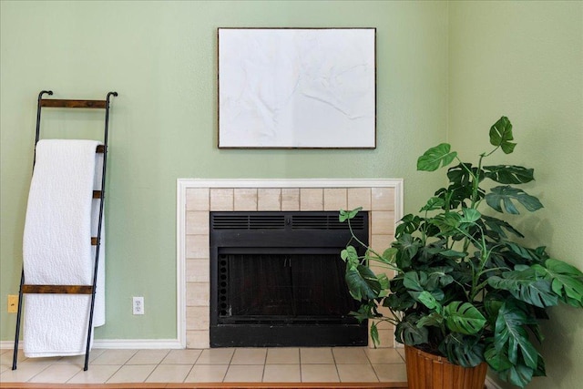 2804 Rio Grande St Unit 211, Austin, TX 78705 - detailed view of a tile fireplace and baseboards