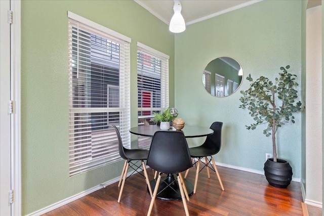 2804 Rio Grande St Unit 211, Austin, TX 78705 - dining area with crown molding and wood finished floors