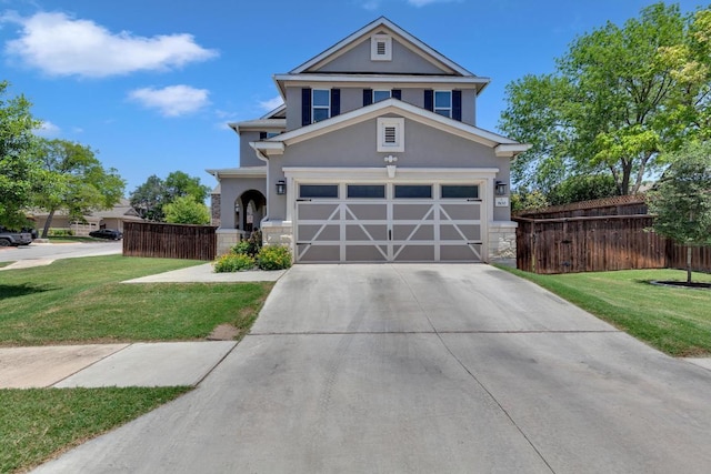 800 Sand Hill Branch Dr Unit 38, Austin, TX 78748 - view of front of home featuring stucco siding, concrete driveway, stone siding, and a garage