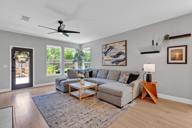 800 Sand Hill Branch Dr Unit 38, Austin, TX 78748 - living room featuring light wood-style floors and ceiling fan