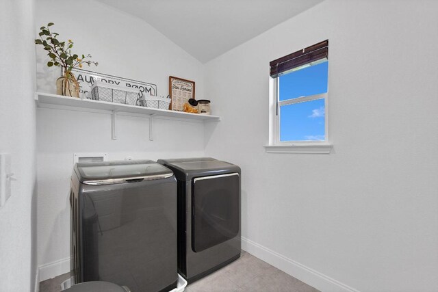800 Sand Hill Branch Dr Unit 38, Austin, TX 78748 - washroom with washer and dryer and light tile patterned floors