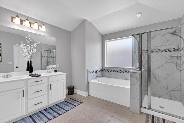 800 Sand Hill Branch Dr Unit 38, Austin, TX 78748 - full bathroom featuring a garden tub, double vanity, a stall shower, and tile patterned flooring