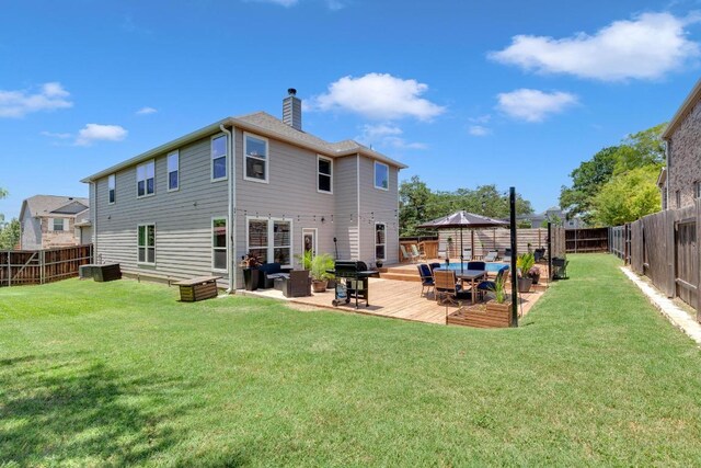 800 Sand Hill Branch Dr Unit 38, Austin, TX 78748 - rear view of property with a chimney, a fenced backyard, and a wooden deck
