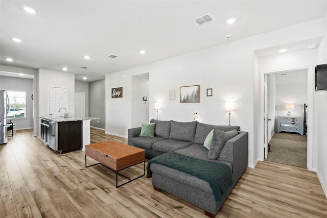 1037 Oxford Ln, Troy, TX 76579 - living area with light wood-style floors and recessed lighting
