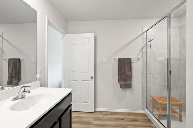 1037 Oxford Ln, Troy, TX 76579 - full bath with vanity, wood finished floors, and a stall shower