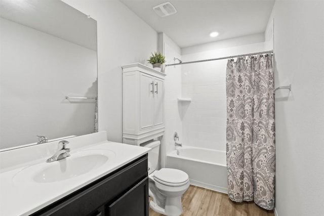 1037 Oxford Ln, Troy, TX 76579 - full bath with wood finished floors, vanity, and shower / bath combo with shower curtain
