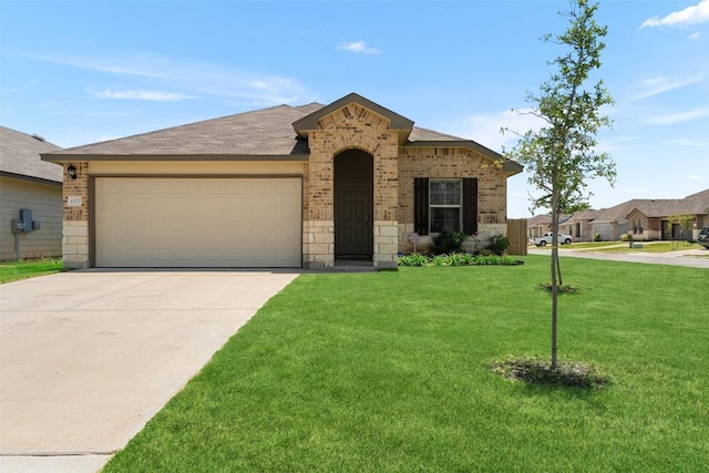 1037 Oxford Ln, Troy, TX 76579 - view of front of property with brick siding, concrete driveway, an attached garage, a front lawn, and stone siding