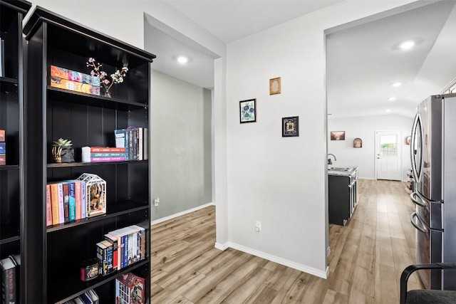 1037 Oxford Ln, Troy, TX 76579 - hall with light wood-type flooring and recessed lighting