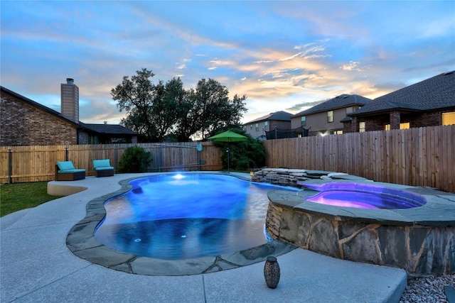 1236 Yellow Iris Rd, Leander, TX 78641 - view of swimming pool featuring a fenced backyard and a pool with connected hot tub