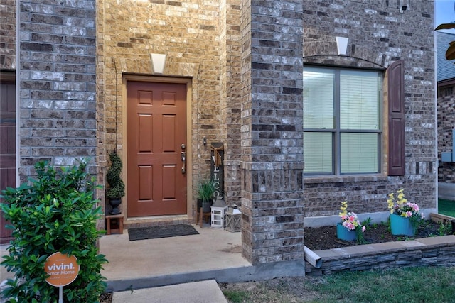 1236 Yellow Iris Rd, Leander, TX 78641 - doorway to property featuring brick siding