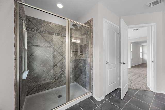 1236 Yellow Iris Rd, Leander, TX 78641 - full bath featuring tile patterned flooring and a stall shower