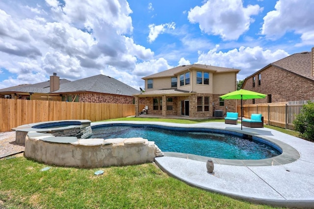 1236 Yellow Iris Rd, Leander, TX 78641 - view of pool with a fenced backyard, a pool with connected hot tub, and a patio