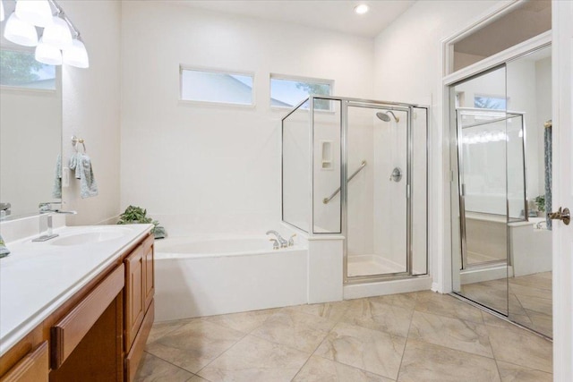 101 Goldenrod Way, Georgetown, TX 78633 - full bathroom with vanity, a shower stall, and a bath